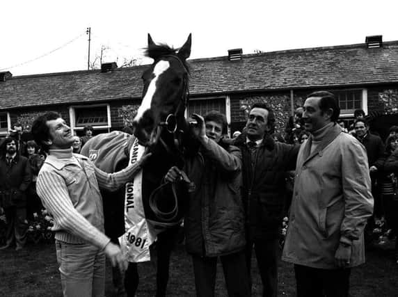 Trainer Josh Gifford (second right) with Aldaniti, jockey Bob Champion (left) and owner Nick Embiricos at the Gifford Stables.