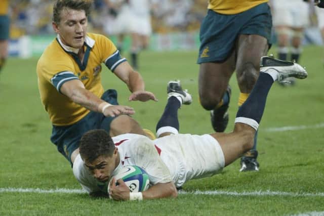 England's Jason Robinson scores his try in the Rugby World Cup final against Australia in 2003.