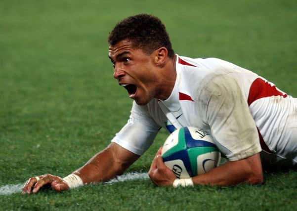England's Jason Robinson celebrates after scoring in the Rugby World Cup final against Australia in 2003.