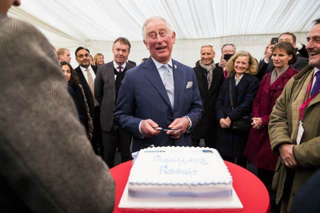 The Prince of Wales, President and Royal Founding Patron of Business in the Community (BITC) prepares to cut a birthday cake while attending the Business in the Community Waste-to-Wealth Summit at the Southwark Integrated Waste Management Facility in London.