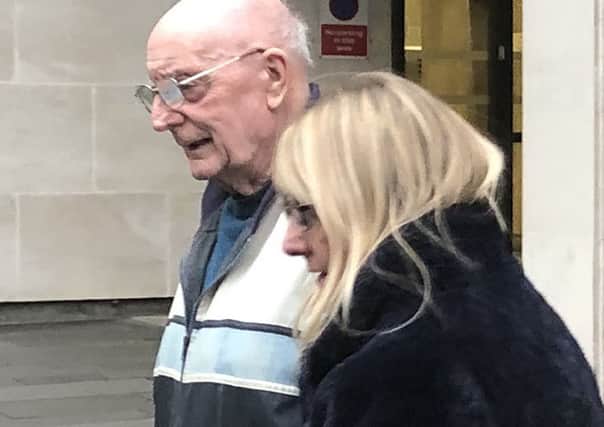 Lawrence Franks (left) outside Manchester Crown Court. The 84-year-old, who killed his dementia-suffering wife with an iron pole in an "act of mercy" has walked free from court..