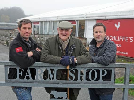 Charlie Hinchliffe, 94 with his grandsons Ben and Simon Hirst at Hinchliffe's Farm Shop at Netherton near Huddersfield