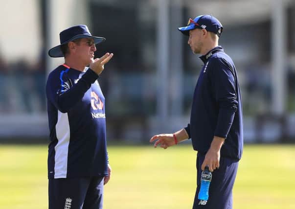 England's captain Joe Root (right) with coach Trevor Bayliss.