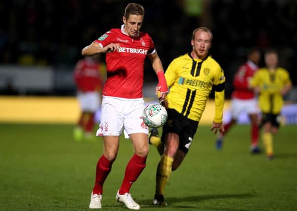 Familiar face: Former Hull City captain Michael Dawson, left, is back at the KCOM Stadium with his new employers at Nottingham Forest, today. (Picture: Nigel French/PA)