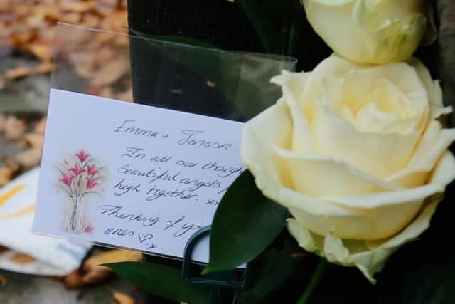 "In all our thoughts;" cards and flowers left at the scene