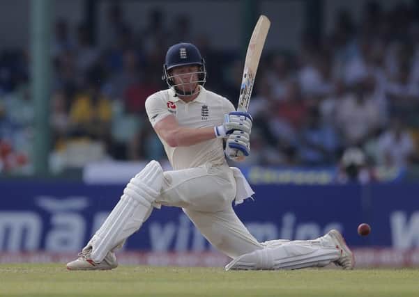 England's Jonny Bairstow sweeps to the square leg boundary on his way to scoring a century against Sri Lanka on day one of the third Test in ColomboAP/Eranga Jayawardena,