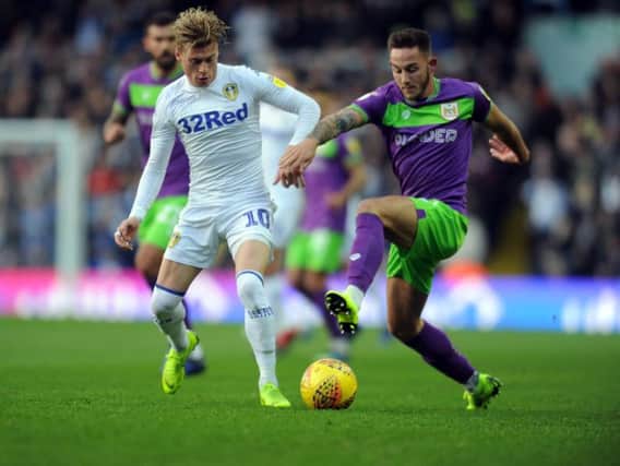 Leeds' Ezgjan Alioski tussles with Bristol Josh Brownhill. Picture: Tony Johnson.