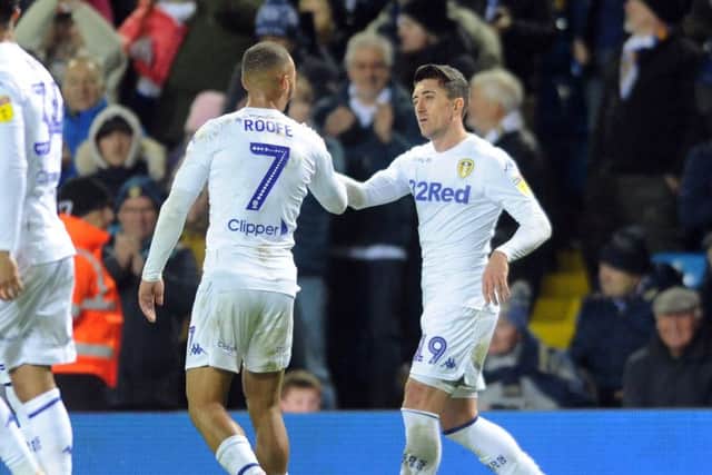 Kemar Roofe congratulates Pablo Hernandez on his goal for Leeds United against Bristol City at Elland Road on Saturday. Picture: Tony Johnson.