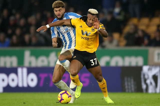 EVERYWHERE MAN: Huddersfield Town's Philip Billing (left, was particularly impressive for the Terriers at Molineux. Picture: Nick Potts/PA