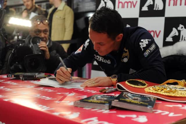 Josh Warrington signs copies of his DVD Fighting for a City at HMV Leeds 26th November 2018 ..Picture by Simon Hulme