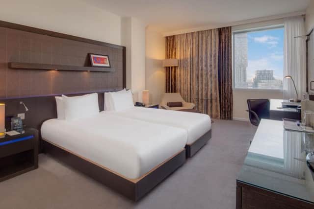 Part one of a Two Bedroom Family Room at London Hilton Canary Wharf