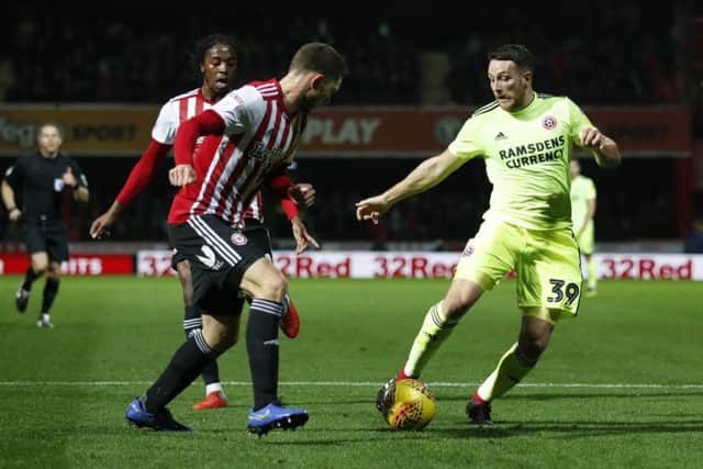 Sheffield United's Conor Washington is held up on the edge of the Brentford penalty area at Griffin Park. Picture: David Klein/Sportimage