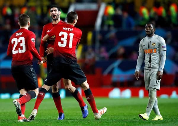 Manchester United's Marouane Fellaini (second left) celebrates scoring his side's winning goal at Old Trafford. Picture: Martin Rickett/PA