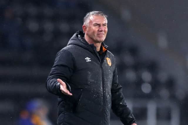 Hull City manager Nigel Adkins on a wet night at the KCOM Stadium. Picture: Simon Cooper/PA