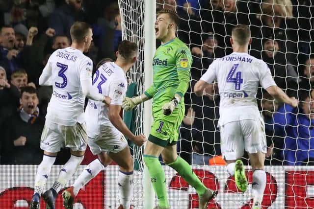 Saved: Leeds United goalkeeper Bailey Peacock-Farrell celebrates after saving the late penalty.