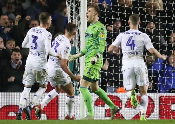 Saved: Leeds United goalkeeper Bailey Peacock-Farrell celebrates after saving the late penalty.