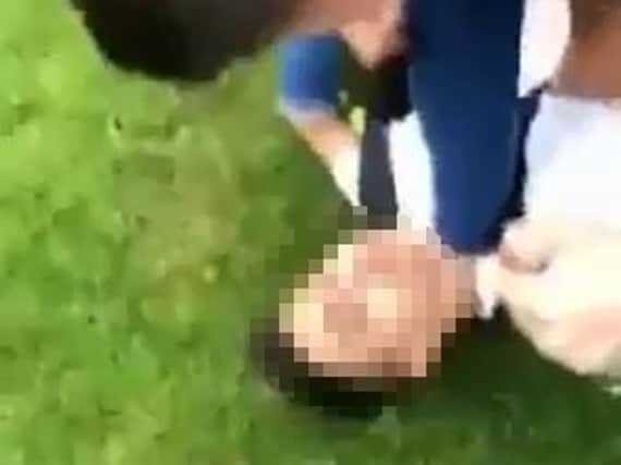 A video of the assault was shared widely on social media, prompting calls for police to take action.
