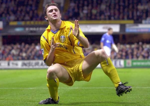 Robbie Keane celebrates scoring for Leeds United against Ipswich Town.