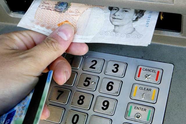ATMs are closing at an alrming rate, says Huw Merriman.