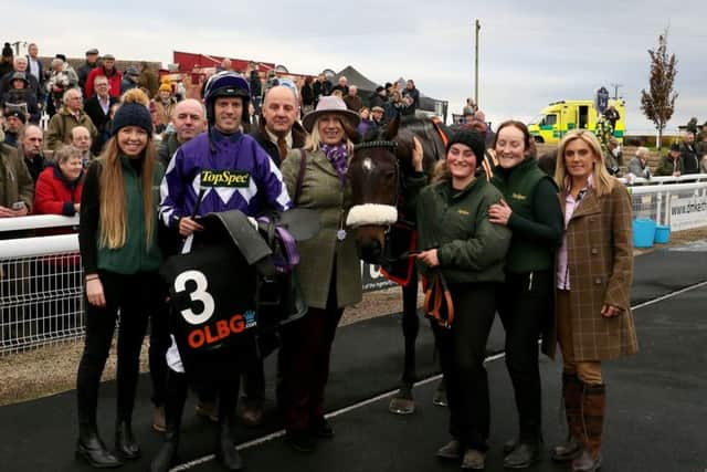 Jayne Sivills is pictured with Lady Buttons, and traioner Phil Kirby's team, after their Wetherby win last month.