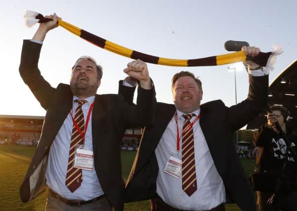 Happier days: Bradford co-owners Edin Rahic (left) and Stefan Rupp celebrate after the final whistle during the Sky Bet League One playoff semi-final, second leg match at Highbury Stadium, Fleetwood. (Picture: PA)