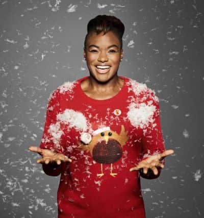 Nicola Adams wears a robin jumper in aid of Save the Children this year.