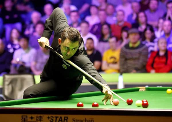 Ronnie O'Sullivan on his way to winning his second round match against Ken Doherty.