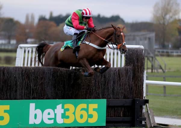 Charlie Hall Chase winner Definitly Red is set to reappear at Aintree on Saturday.