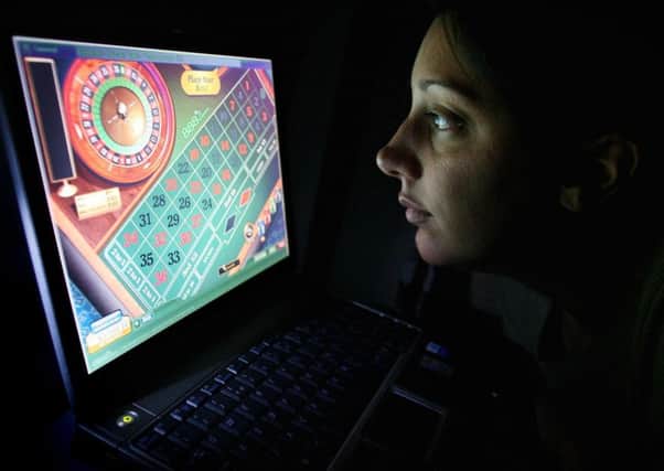 How should online gambling be regulated?