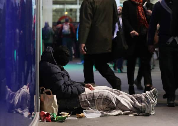 Helping hand: Business can help reduce homelessness by taking the bold step of providing employment. Pic: PA