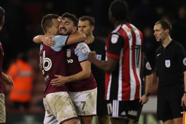 Robert Snodgrass of Aston Villa celebrates scoring the winning goal with John Terry against Sheffield United last season.