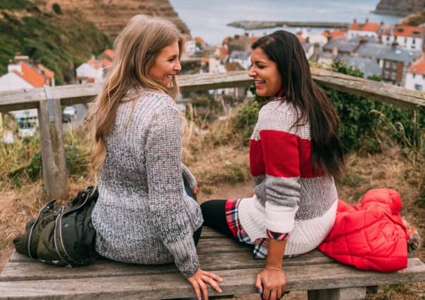 Sinead Crowe, left, of LoveStyleMindfulness wears Seahouse knit, £79.95; Bonnie Rahkit, aka The Style Traveller, wears Padstow knit, £99.95. All at Barbour.com.