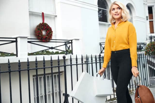 Yellow blouse, Â£29.50; black trousers, Â£35; bag, Â£39.50. #hollysmusthaves at Marks & Spencer.