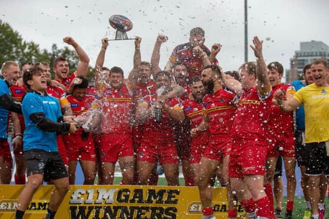 MAGIC MOMENT: London Broncos celebrate promotion to Super League after defeating Toronto Wolfpack in the 'One Million Pound' match. Picture by Kevin Sousa/SWpix.com