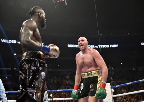 Tyson Fury taunts Deontay Wilder during their recent world heavyweight title bout at the Staples Center in Los Angeles. Picture: Lionel Hahn/PA