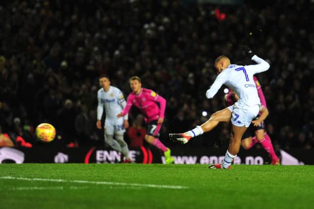 On target: Leeds United's Kemar Roofe scores from the spot
.Picture: Gerard Binks