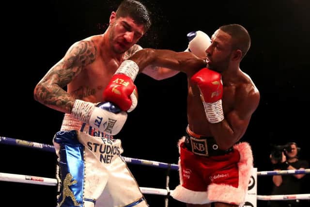 Michael Zerafa (left) and Kell Brook in action at the FlyDSA Arena. Picture: Nick Potts/PA
