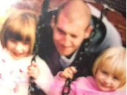 Lee pictured with Nicola's daughters, Megan and Leanne, in a park in Beeston around six years ago