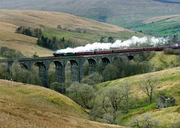 The Flying Scotsman passes over the viaduct at Dent - it was Margaret Thatcher's government which saved the Settle to Carlisle railway.