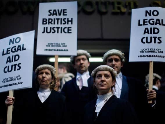 Barristers protesting the changes to legal aid