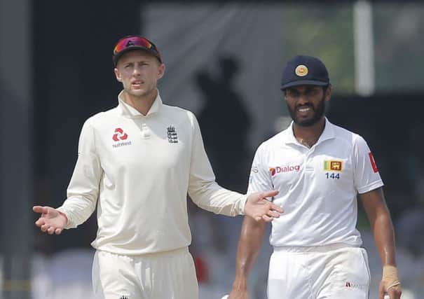 NEW CHALLENGE: England TEst captain Joe Root gestures to the umpire during the third Test against Sri Lanka in Colombo last month. Picture: AP/Eranga Jayawardena.