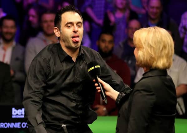 Ronnie O'Sullivan reacts to a question from BBC presenter Hazel Irvine after winning the Betway UK Championship at the York Barbican on Sunday (Picture: Richard Sellers/PA Wire).