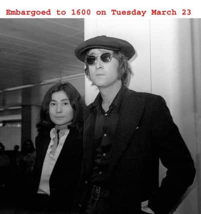 John Lennon with his wife Yoko Ono