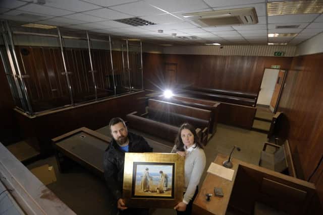 The former Pontefract Magistrates Court is being turned into an antiques market. Managers Michael Cairns and Jodie Goodall are pictured inside the courtroom.