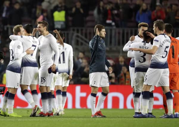 Tottenham players celebrate after their 1-1 draw with Barcelona at the Niou Camp. Picture: AP/Emilio Morenatti