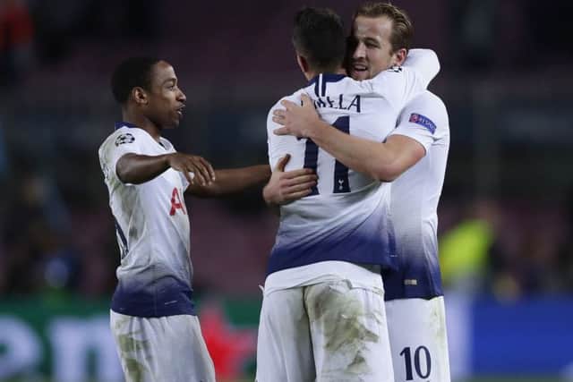 Tottenham's players celebrate after their 1-1 draw against Barcelona at the Nou Camp earned them progression to the Champions League knockout stages. Picture: AP/Manu Fernandez