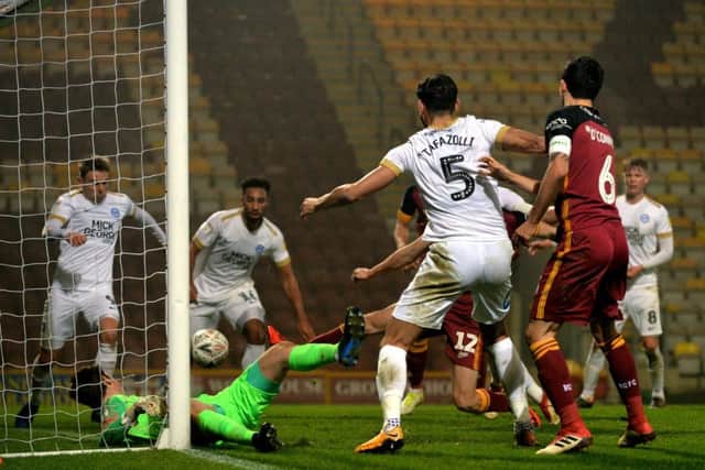 GET IN: George Miller scores Bradford City's fourth goal.  Picture: Bruce Rollinson