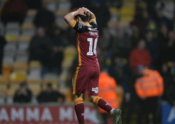Jack Payne reacts after missing his penalty. for Bradford City at Valley Parade.  Picture: Bruce Rollinson