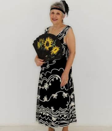 Linda wears: Phase Eight black and silver dress, Â£17.99. All other accessories, model's own. .Picture by Simon Hulme