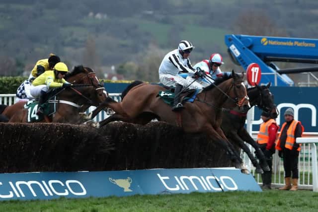 Rock The World ridden by jockey Robbie Power (front right) on the way to winning the Johnny Henderson Grand Annual Challenge Cup Handicap Chase during Gold Cup Day of the 2017 Cheltenham Festival at Cheltenham Racecourse. (Picture: David Davies/PA Wire)